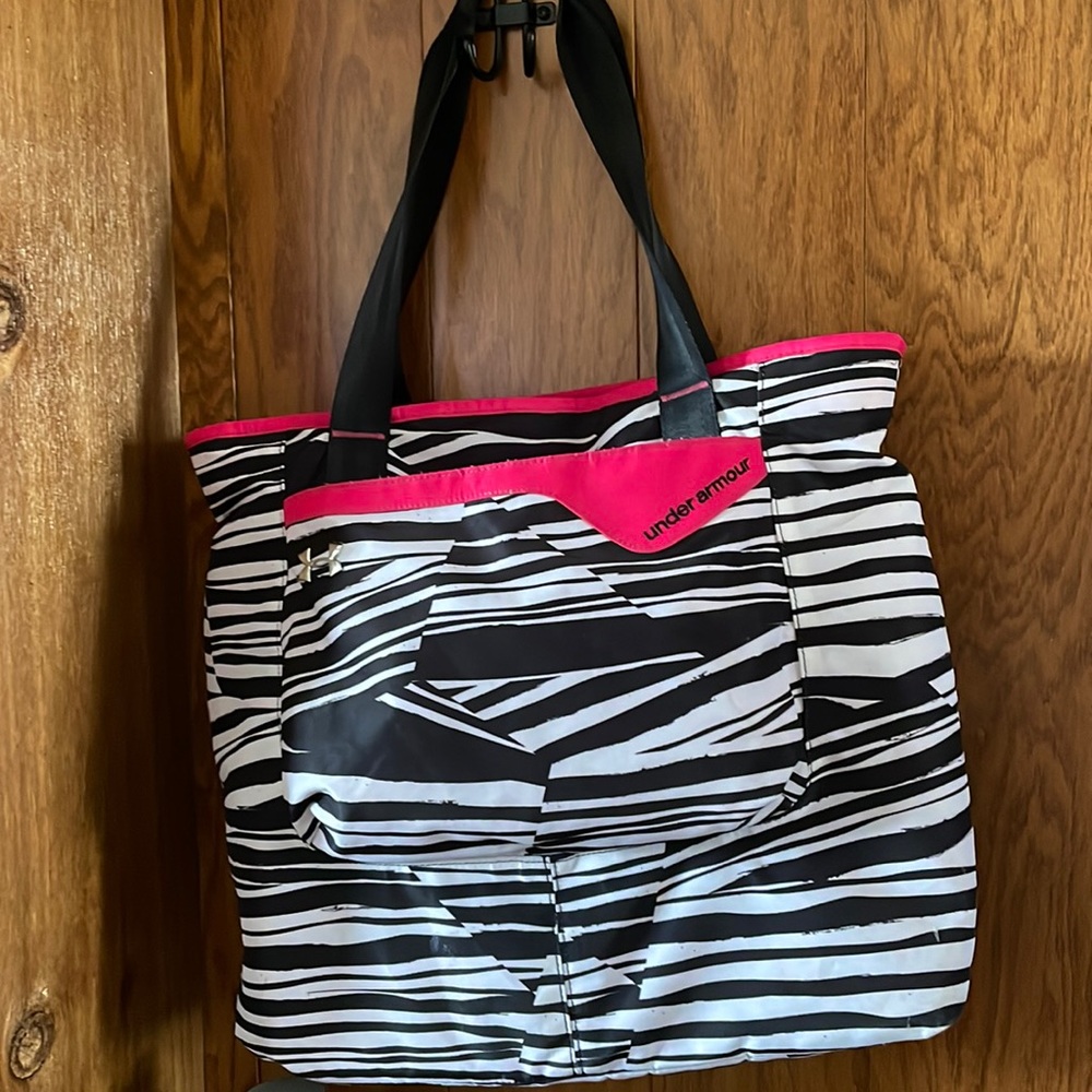 Gently used Women’s Under Armour Zebra print bag.